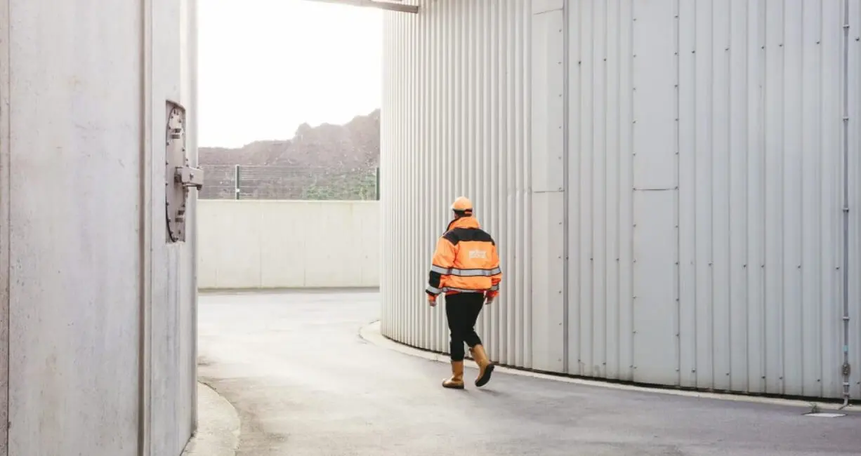 Man walking at East London Biogas' anaerobic digestion facility